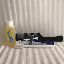 $1.12 Hygiene Kit - shampoo/body wash, comb, razor, toothbrush.
