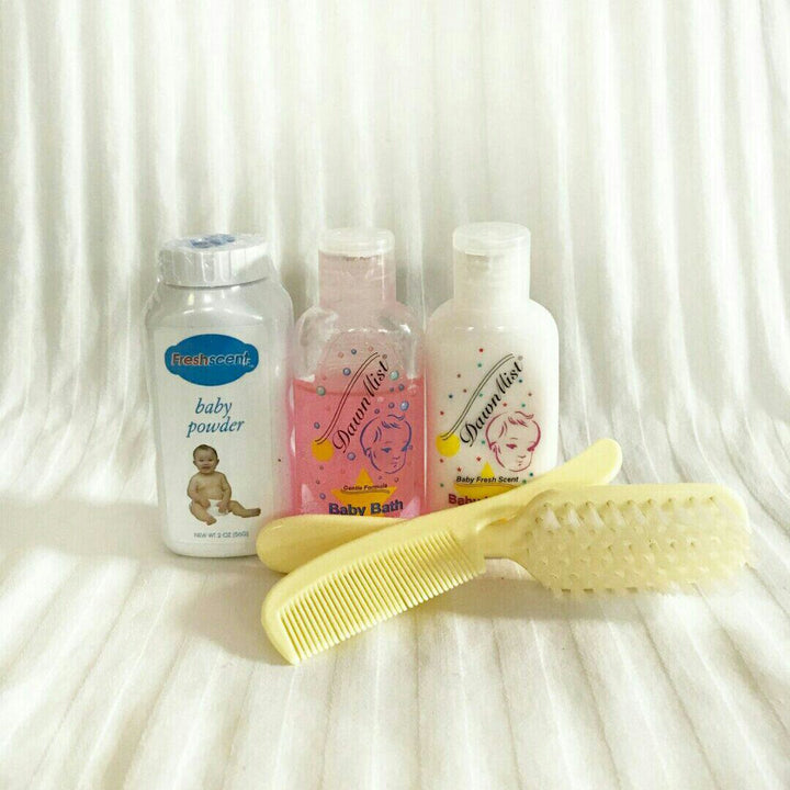 Infant Starter Kit - comb, brush, baby powder, baby lotion, baby shampoo.
